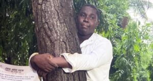 Abdul Hakim: Ghanaian journalist sets world record for longest time hugging tree