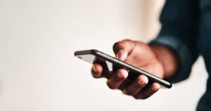 The way you're holding your phone right now is hurting your hands