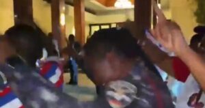 Uniformed policewoman celebrates with NPP after party secures top spot on ballot